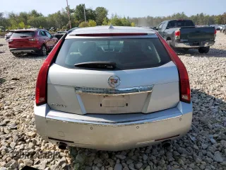 2010 Cadillac CTS Performance z VIN 1G6DM8EG9A0126811, wystawiony jako Copart lot #71155534 z przebiegiem 146 947 mil mil oraz Szkoda całkowita • Salvage title. Historia ofert i sprzedaży dostępna na DreamBid. Obrazek 6.