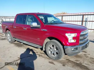 2015 Ford F-150 XLT with VIN 1FTEW1EGXFKE21995, listed as a IAAI auction lot 41475951 with 123,900 mi miles. Bid and sale history available at carsss.com. Image 1.