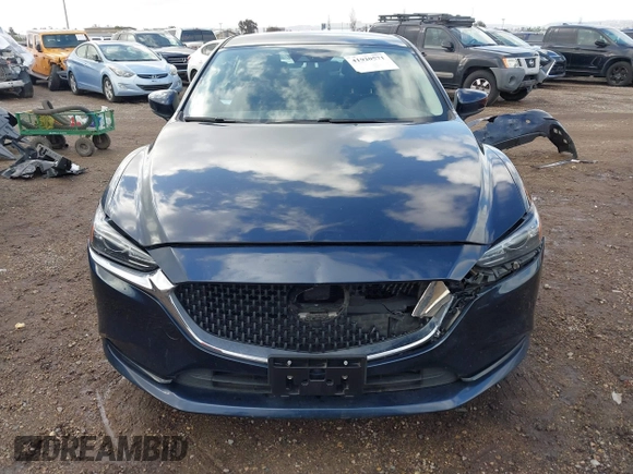 2020 Mazda 6 Sport with VIN JM1GL1UM5L1519519, listed as a IAAI auction lot 41920571 with 59,378 mi miles and . Bid and sale history available at DreamBid. Image 13.