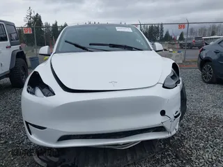 2023 Tesla Model Y Long Range with VIN 7SAYGDEE7PF809164, listed as a IAAI auction lot 41828974 with 31,772 mi miles. Bid and sale history available at carsss.com. Image 12.