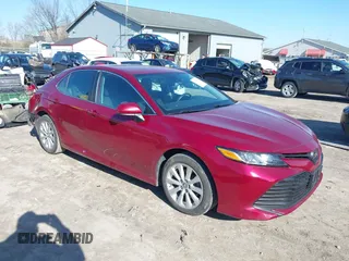 2019 Toyota Camry LE with VIN 4T1B11HK1KU233345, listed as a IAAI auction lot 41971136 with 51,499 mi miles and . Bid and sale history available at DreamBid. Image 1.