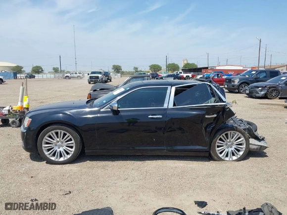 2013 Chrysler 300 with VIN 2C3CCAET4DH504540, listed as a IAAI auction lot 41943328 with 105,823 mi miles. Bid and sale history available at carsss.com. Image 14.