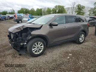 2019 Kia Sorento LX z VIN 5XYPGDA30KG561273, wystawiony jako Copart lot #57395685 z przebiegiem 121 739 mil mil oraz Szkoda całkowita • Salvage title. Historia ofert i sprzedaży dostępna na DreamBid. Obrazek 1.