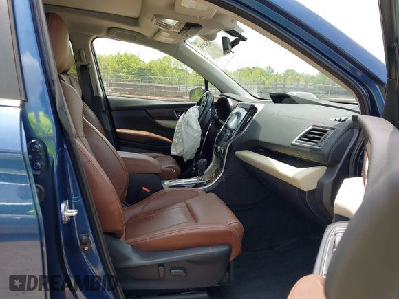 2022 Subaru Ascent Touring with VIN 4S4WMARD3N3468252, listed as a IAAI auction lot 42439251 with 59,811 mi miles and . Bid and sale history available at DreamBid. Image 5.