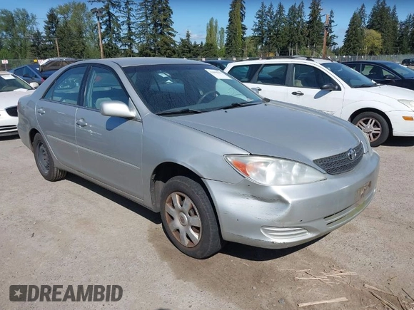 2004 Toyota Camry LE with VIN 4T1BE32K74U350908, listed as a IAAI auction lot 42099989 with 120,971 mi miles. Bid and sale history available at carsss.com. Image 1.