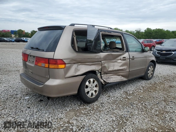 2003 Honda Odyssey EX z VIN 5FNRL186X3B152340, wystawiony jako Copart lot #57883455 z przebiegiem 214 008 mil mil oraz Szkoda całkowita • Salvage title. Historia ofert i sprzedaży dostępna na DreamBid. Obrazek 3.