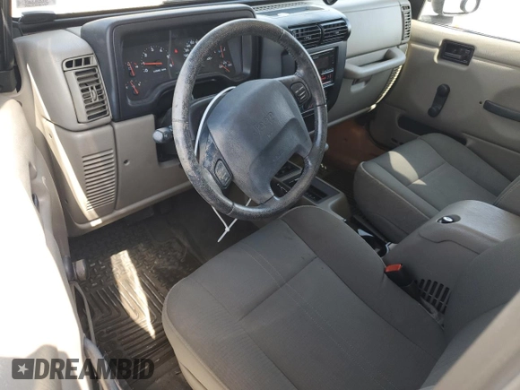 2003 Jeep Wrangler Sahara with VIN 1J4FA59S53P369077, listed as a Copart auction lot 61445025 with 147,904 mi miles and Clean title. Bid and sale history available at DreamBid. Image 8.