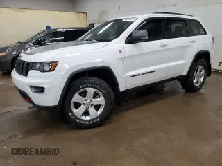 2019 Jeep Grand Cherokee Trailhawk z VIN 1C4RJFLG4KC581794, wystawiony jako Copart lot #63522335 z przebiegiem 122 407 mil mil oraz Czysty tytuł • Clean title. Historia ofert i sprzedaży dostępna na DreamBid. Obrazek 1.