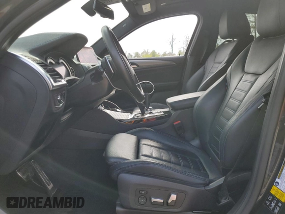 2019 BMW X4 M40i with VIN 5UXUJ5C5XKLJ64004, listed as a Copart auction lot 52106895 with 74,599 mi miles and Salvage title. Bid and sale history available at DreamBid. Image 7.