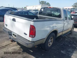 1999 Ford F-150 XL with VIN 2FTRX17L6XCB21286, listed as a IAAI auction lot 41891244 with Not provided miles and . Bid and sale history available at DreamBid. Image 4.