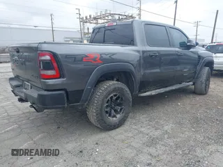 2022 Ram 1500 TRX with VIN 1C6SRFU98NN334983, listed as a IAAI auction lot 42010145 with 19,207 mi miles and . Bid and sale history available at DreamBid. Image 4.