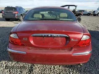 2000 Jaguar S-Type V8 z VIN SAJDA01D7YGL57521, wystawiony jako Copart lot #84539364 z przebiegiem Nie podano mil oraz Szkoda całkowita • Salvage title. Historia ofert i sprzedaży dostępna na DreamBid. Obrazek 6.