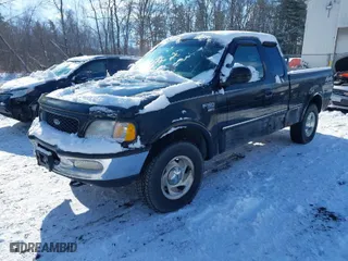1998 Ford F-150 Standard with VIN 1FTZX18W6WNB19121, listed as a IAAI auction lot 41461736 with 149,257 mi miles. Bid and sale history available at carsss.com. Image 2.