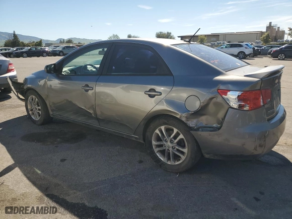 2012 Kia Forte EX with VIN KNAFU4A22C5585562, listed as a Copart auction lot 50576605 with 237,246 mi miles and Salvage Title. Bid and sale history available at carsss.com. Image 2.