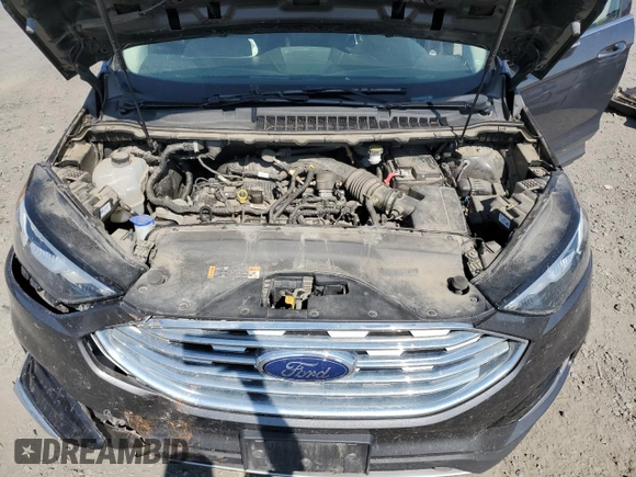 2020 Ford Edge SEL with VIN 2FMPK4J97LBA79730, listed as a Copart auction lot 59992555 with 80,902 mi miles and Salvage title. Bid and sale history available at DreamBid. Image 12.
