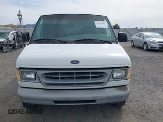 1998 Ford Econoline Cargo with VIN 1FTRE142XWHC01733, listed as a IAAI auction lot 41685605 with 154,476 mi miles. Bid and sale history available at carsss.com. Image 6.