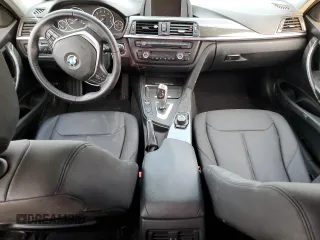 2014 BMW 3 Series 328i with VIN WBA3C1C52EK111563, listed as a Copart auction lot 51465165 with 142,125 mi miles and Salvage title. Bid and sale history available at DreamBid. Image 8.