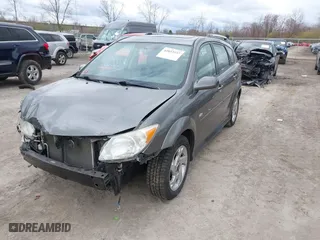 2007 Pontiac Vibe with VIN 5Y2SL65837Z414154, listed as a IAAI auction lot 42033597 with 121,728 mi miles. Bid and sale history available at carsss.com. Image 2.