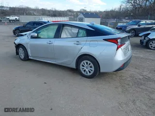 2022 Toyota Prius L Eco with VIN JTDKAMFU7N3176041, listed as a IAAI auction lot 41562977 with 61,964 mi miles. Bid and sale history available at carsss.com. Image 3.