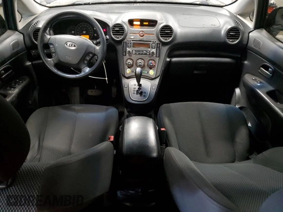 2008 Kia Rondo LX Base with VIN KNAFG525287212765, listed as a Copart auction lot 87700005 with 286,337 mi miles and Salvage Title. Bid and sale history available at carsss.com. Image 8.