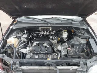 2005 Ford Escape Limited with VIN 1FMYU04155KA77626, listed as a IAAI auction lot 41368626 with 215,182 mi miles. Bid and sale history available at carsss.com. Image 10.