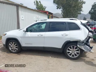 2014 Jeep Cherokee Limited with VIN 1C4PJLDB2EW173127, listed as a IAAI auction lot 42413180 with 107,871 mi miles and . Bid and sale history available at DreamBid. Image 14.