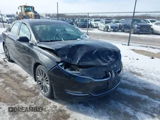 2014 Lincoln MKZ z VIN 3LN6L2GKXER809691, wystawiony jako IAAI lot #41588488 z przebiegiem 163 552 mil mil oraz . Historia ofert i sprzedaży dostępna na DreamBid. Obrazek 12.