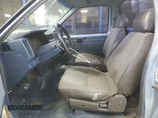 1986 Nissan Hardbody E z VIN JN6ND11S8GW026883, wystawiony jako Copart lot #84040874 z przebiegiem 193 104 mil mil oraz Szkody całkowita. Historia ofert i sprzedaży dostępna na DreamBid. Obrazek 7.