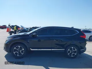 2018 Honda CR-V Touring with VIN 2HKRW2H91JH630702, listed as a IAAI auction lot 41983516 with 84,355 mi miles. Bid and sale history available at carsss.com. Image 14.