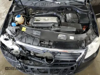 2010 Volkswagen Passat z VIN WVWJK9AN4AE096359, wystawiony jako Copart lot #50740075 z przebiegiem 196 126 mil mil oraz Szkoda całkowita • Salvage title. Historia ofert i sprzedaży dostępna na DreamBid. Obrazek 11.
