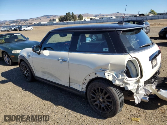 2021 MINI Hardtop Cooper with VIN WMWXR3C07M2N96541, listed as a Copart auction lot 78748714 with 28,706 mi miles and Salvage title. Bid and sale history available at DreamBid. Image 2.