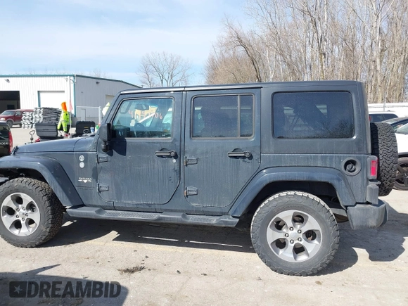 2016 Jeep Wrangler Unlimited 75th Anniversary with VIN 1C4BJWEG9GL250408, listed as a IAAI auction lot 41793706 with 102,436 mi miles. Bid and sale history available at carsss.com. Image 14.