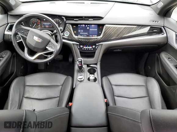 2023 Cadillac XT6 FWD Premium Luxury z VIN 1GYKPCRS5PZ119186, wystawiony jako Copart lot #50577175 z przebiegiem 32 189 mil mil oraz Szkoda całkowita • Salvage title. Historia ofert i sprzedaży dostępna na DreamBid. Obrazek 8.