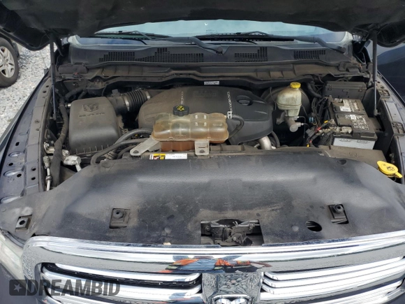 2015 Ram 1500 Outdoorsman z VIN 1C6RR7LM9FS719918, wystawiony jako Copart lot #56798485 z przebiegiem 187 443 mil mil oraz Czysty tytuł • Clean title. Historia ofert i sprzedaży dostępna na DreamBid. Obrazek 11.