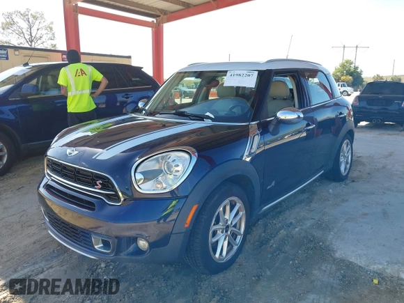 2015 MINI Countryman S z VIN WMWZC5C5XFWP42217, wystawiony jako IAAI lot #41982207 z przebiegiem Nie podano mil oraz . Historia ofert i sprzedaży dostępna na DreamBid. Obrazek 2.