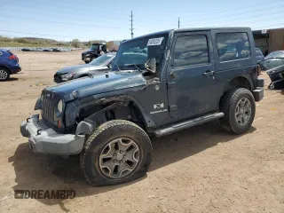 2007 Jeep Wrangler X z VIN 1J4FA24137L128175, wystawiony jako Copart lot #54085225 z przebiegiem 115 949 mil mil oraz Szkoda całkowita • Salvage title. Historia ofert i sprzedaży dostępna na DreamBid. Obrazek 1.