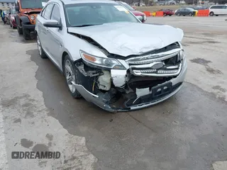2012 Ford Taurus SHO z VIN 1FAHP2KT6CG142954, wystawiony jako IAAI lot #41526760 z przebiegiem 187 887 mil mil oraz . Historia ofert i sprzedaży dostępna na DreamBid. Obrazek 6.