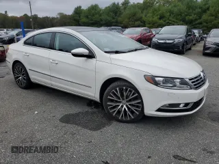 2014 Volkswagen CC VR6 Executive 4Motion with VIN WVWGU7AN2EE523987, listed as a Copart auction lot 71685214 with 77,732 mi miles and Salvage Title. Bid and sale history available at carsss.com. Image 4.