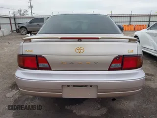 1996 Toyota Camry DX with VIN 4T1BG12K8TU738565, listed as a IAAI auction lot 41702096 with 100,587 mi miles. Bid and sale history available at carsss.com. Image 17.