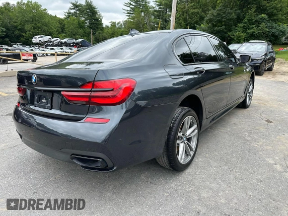 2019 BMW 7 Series 740i xDrive with VIN WBA7E4C55KGV28722, listed as a Copart auction lot 64955445 with 94,901 mi miles and Clean title. Bid and sale history available at DreamBid. Image 3.
