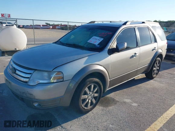 2008 Ford Taurus X SEL z VIN 1FMDK02W48GA11501, wystawiony jako IAAI lot #42184768 z przebiegiem 247 428 mil mil oraz . Historia ofert i sprzedaży dostępna na DreamBid. Obrazek 2.