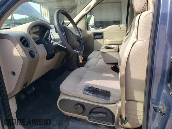 2004 Ford F-150 XL z VIN 1FTRF12WX4NB19843, wystawiony jako Copart lot #63184855 z przebiegiem 275 692 mil mil oraz Szkoda całkowita • Salvage title. Historia ofert i sprzedaży dostępna na DreamBid. Obrazek 7.