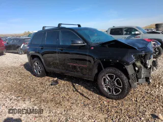 2022 Jeep Grand Cherokee Trailhawk with VIN 1C4RJHCG1N8574207, listed as a Copart auction lot 52789925 with 31,549 mi miles and Salvage title. Bid and sale history available at DreamBid. Image 4.