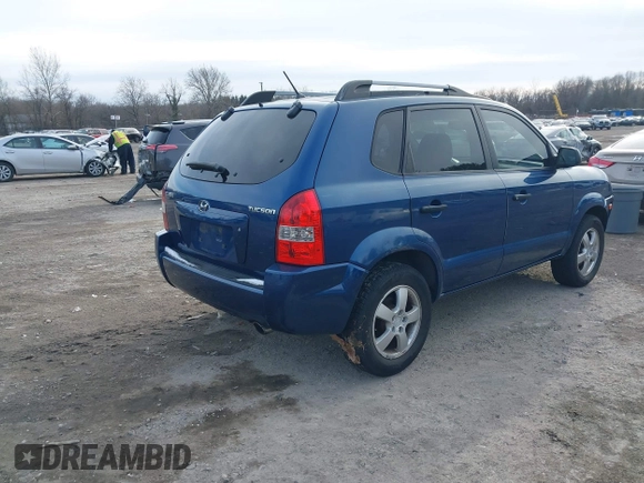 2007 Hyundai Tucson GLS with VIN KM8JM12B77U617990, listed as a IAAI auction lot 41300579 with 167,789 mi miles. Bid and sale history available at carsss.com. Image 4.