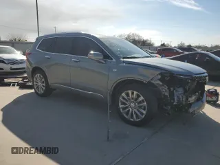 2023 Cadillac XT6 FWD Premium Luxury with VIN 1GYKPCRS4PZ124119, listed as a Copart auction lot 87836515 with 14,752 mi miles and Salvage title. Bid and sale history available at DreamBid. Image 4.