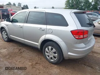 2014 Dodge Journey American Value with VIN 3C4PDCAB5ET198704, listed as a IAAI auction lot 42368950 with 220,615 mi miles and . Bid and sale history available at DreamBid. Image 3.