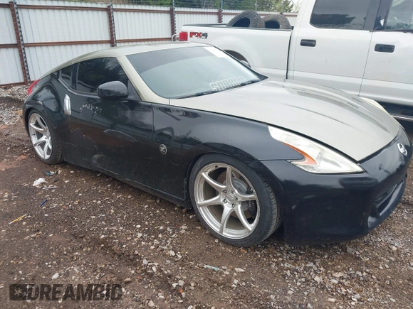 2009 Nissan 370Z Touring with VIN JN1AZ44E69M404341, listed as a IAAI auction lot 41907551 with 144,612 mi miles and . Bid and sale history available at DreamBid. Image 1.