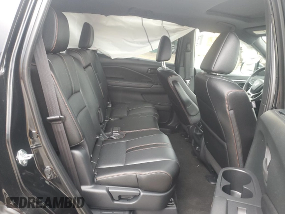 2023 Honda Passport TrailSport with VIN 5FNYF8H65PB040661, listed as a Copart auction lot 52137585 with 32,100 mi miles and Salvage Title. Bid and sale history available at carsss.com. Image 10.