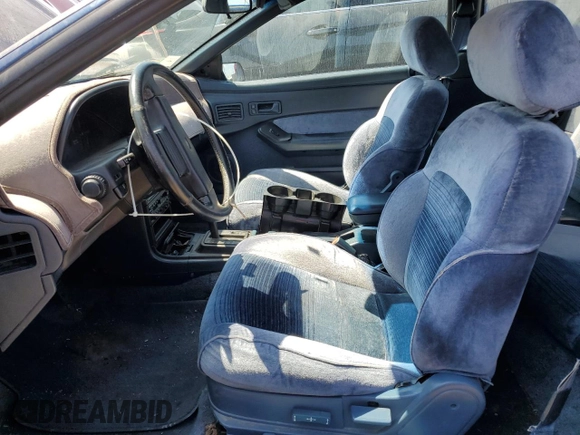 1989 Ford Probe z VIN 1ZVBT21C9K5202343, wystawiony jako Copart lot #55885985 z przebiegiem 150 457 mil mil oraz Czysty tytuł • Clean title. Historia ofert i sprzedaży dostępna na DreamBid. Obrazek 7.