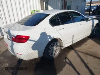 2015 BMW 5 Series 528i with VIN WBA5A5C5XFD520132, listed as a IAAI auction lot 41433751 with 76,576 mi miles and . Bid and sale history available at DreamBid. Image 4.